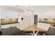 Modern kitchen with stainless steel appliances, granite countertops, and ample cabinet space at 2561 Grapevine Cir # 104, Cumming, GA 30041