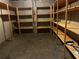 Basement storage area with lots of wood shelving for organizing items and keeping tidy at 3360 Keenland Rd, Marietta, GA 30062