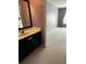 Bathroom featuring a sleek sink vanity and a view into an adjoining bedroom at 3360 Keenland Rd, Marietta, GA 30062