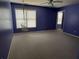 Spacious bedroom featuring a ceiling fan, a large window, and a unique hanging chair at 3360 Keenland Rd, Marietta, GA 30062
