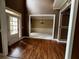 Elegant foyer with hardwood floors, leading to a formal dining room and featuring natural light at 3360 Keenland Rd, Marietta, GA 30062
