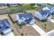 Birds-eye view of the property, highlighting the house, lawn, landscaping, privacy fence and surrounding neighborhood at 4607 Underwood Walk, Powder Springs, GA 30127