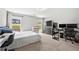 Bedroom with natural light, carpet flooring, and modern furniture at 4607 Underwood Walk, Powder Springs, GA 30127