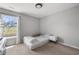 Minimal bedroom with carpet flooring, a window, and natural light at 4607 Underwood Walk, Powder Springs, GA 30127