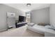 Bedroom with carpet flooring, a large mirror, and natural light at 4607 Underwood Walk, Powder Springs, GA 30127