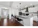 Spacious kitchen featuring a center island with seating, stainless appliances, and stylish finishes for modern living at 4607 Underwood Walk, Powder Springs, GA 30127