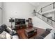 Spacious living room with high ceilings, hardwood floors, and staircase to second floor at 4607 Underwood Walk, Powder Springs, GA 30127