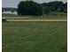 Beautiful view of the backyard overlooking the tranquil lake at 1111 Lake Varner Dr, Covington, GA 30014