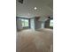 Bedroom with two large windows and a double door closet with ceiling fan at 1111 Lake Varner Dr, Covington, GA 30014
