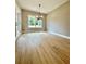Dining room with a large window and neutral wall colors at 1111 Lake Varner Dr, Covington, GA 30014
