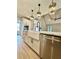 Close up of the farmhouse sink with stainless steel dishwasher in kitchen area at 1111 Lake Varner Dr, Covington, GA 30014
