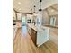 Kitchen open to the living area featuring stainless steel appliances and marble counters at 1111 Lake Varner Dr, Covington, GA 30014