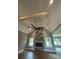 Living room boasts hardwood floors, a stone fireplace, wooden beams and vaulted ceilings at 1111 Lake Varner Dr, Covington, GA 30014