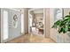 Inviting foyer with tile flooring, decorative niche, and view into the formal living room at 127 Courts Of Hampton, Hampton, GA 30228