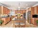 Spacious kitchen with stainless steel appliances, granite countertops, and a central island at 127 Courts Of Hampton, Hampton, GA 30228