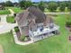 Expansive backyard view showcases a large deck perfect for outdoor entertaining at 127 Courts Of Hampton, Hampton, GA 30228