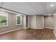 Finished basement featuring built-in shelving and a drop ceiling at 2120 Habersham Trce, Cumming, GA 30041