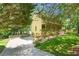 Charming home boasts a two-car garage, and a beautifully landscaped front yard at 2120 Habersham Trce, Cumming, GA 30041