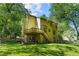 Spacious two-story home features a deck, walkout basement, and manicured lawn at 2120 Habersham Trce, Cumming, GA 30041