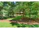Home with a large front yard and mature trees providing a private setting at 2120 Habersham Trce, Cumming, GA 30041