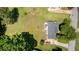 An aerial view shows the spacious lot, landscaping, and home's position on a quiet street with mature trees at 2675 Springside Ct, Douglasville, GA 30135