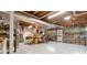 Spacious unfinished basement offers ample storage and potential for customization with quirky wall decorations at 2675 Springside Ct, Douglasville, GA 30135