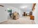 Finished basement with carpet, custom shelving, and versatile layout for storage and entertainment at 2675 Springside Ct, Douglasville, GA 30135