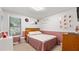 Well-lit bedroom featuring plush carpeting and decorative accents at 2675 Springside Ct, Douglasville, GA 30135