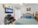 Comfortable bedroom featuring a study desk, ceiling fan and window at 2675 Springside Ct, Douglasville, GA 30135