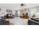 Inviting living room featuring a neutral color palette, plush seating, fireplace and ample natural light at 2675 Springside Ct, Douglasville, GA 30135