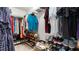 Organized walk-in closet with ample shelving and hanging space for clothes and shoes at 2675 Springside Ct, Douglasville, GA 30135