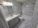 A bathroom showcasing tile walls, tile flooring, modern vanity, a toilet, and a bathtub at 3773 Summer Rose Dr, Atlanta, GA 30341