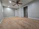 A bedroom showcasing neutral walls, carpet flooring, ceiling fan, closet and bright natural light at 3773 Summer Rose Dr, Atlanta, GA 30341