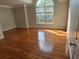 Spacious bedroom with beautiful hardwood floors and lots of natural light at 3773 Summer Rose Dr, Atlanta, GA 30341