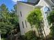 Exterior back view of a house with a well maintained lawn and landscaping at 3773 Summer Rose Dr, Atlanta, GA 30341