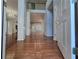 Spacious foyer with gleaming hardwood floors, elegant staircase, and abundant natural light at 3773 Summer Rose Dr, Atlanta, GA 30341