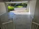 Spacious two-car garage with an open door revealing a view of the front yard at 3773 Summer Rose Dr, Atlanta, GA 30341