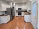 Modern kitchen featuring stainless steel appliances, granite countertops, and ample cabinet space at 3773 Summer Rose Dr, Atlanta, GA 30341