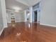 Spacious living room featuring hardwood floors, elegant columns, and open layout at 3773 Summer Rose Dr, Atlanta, GA 30341