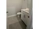 This powder room offers stylish vanity and fixtures at 4297 Azalea Ridge Way, Hoschton, GA 30548