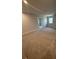 Generous bonus room with neutral colors, recessed lighting, and plush carpet at 4297 Azalea Ridge Way, Hoschton, GA 30548