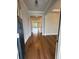 Open foyer with hardwood floors leading to spacious living areas at 4297 Azalea Ridge Way, Hoschton, GA 30548