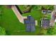 Aerial view of home with new roof and green lawn at 980 Porter Rd, Decatur, GA 30032