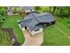 Aerial view of home with new roof and green lawn at 980 Porter Rd, Decatur, GA 30032