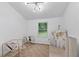 Minimalist bedroom with modern decor, ample natural light, and stylish furnishings at 980 Porter Rd, Decatur, GA 30032