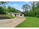 Exterior of updated home with green lawn at 980 Porter Rd, Decatur, GA 30032