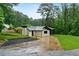 Exterior of updated home with green lawn at 980 Porter Rd, Decatur, GA 30032