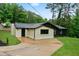Modern home with a well-maintained lawn and contemporary painted brick facade at 980 Porter Rd, Decatur, GA 30032