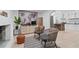 Inviting living room featuring stylish decor, archway, and view of the modern kitchen at 980 Porter Rd, Decatur, GA 30032