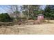 Spacious backyard featuring a shed and natural landscaping at 2886 Thornbriar Rd, Atlanta, GA 30340
